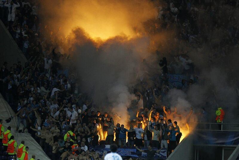 Porto 0-1 Zenit St Petersburg. Zenit fans celebrate the Russian side's ascendance to second place in Group G. With four points from three matches, they have one point more than Porto, in third. Francisco Seco / AP