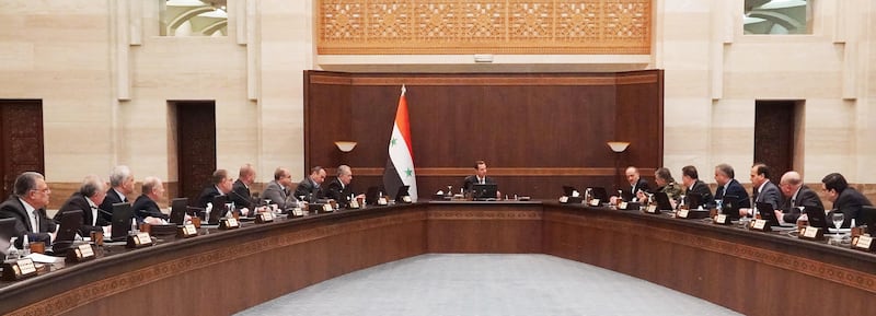 Syrian President Bashar Al Assad (C) leads an emergency cabinet meeting in the capital, Damascus. EPA