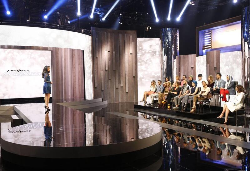 Host Jessica Kahawaty talks to contestants on Project Runway Middle East. Courtesy MBC 