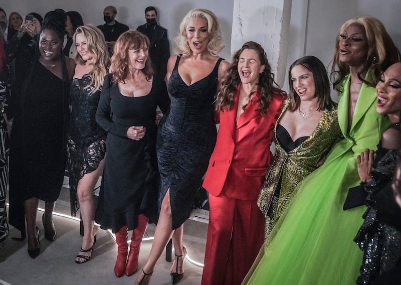 Celebrities who attended Christian Siriano's New York Fashion Week presentation, from left to right: Danielle Brooks, Alicia Silverstone, Susan Sarandon, Hannah Waddingham, Drew Barrymore, Anna Chlumsky, Symone and MJ Rodriguez.  AP