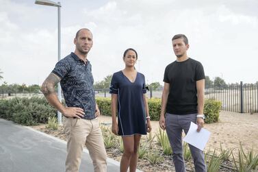 Town Square residents Gabriel Martinez, Kessie Bebel and Ghadir Shaar pictured near the land beside their homes that is being used by partying quad bikers and speeding motorists. Antonie Robertson / The National