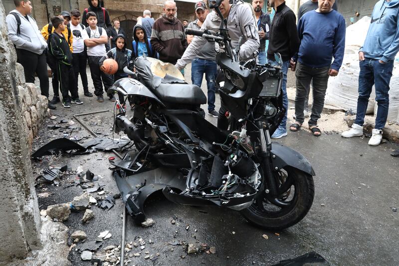 A damaged motorcycle following an explosion that killed a Palestinian man in the West Bank city of Nablus. EPA 