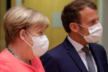 German Chancellor Angela Merkel and French President Emmanuel Macron back the suggested rescue package. AP