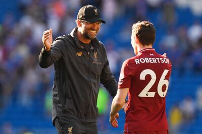 epa07520319 Liverpool manager Juergen Klopp (L) and Andrew Robertson (R) at the end of the English Premier League game between Cardiff and Liverpool at Cardiff City Stadium, Cardiff, Britain, 21 April 2019.  EPA/WILL OLIVER EDITORIAL USE ONLY. No use with unauthorized audio, video, data, fixture lists, club/league logos or 'live' services. Online in-match use limited to 120 images, no video emulation. No use in betting, games or single club/league/player publications