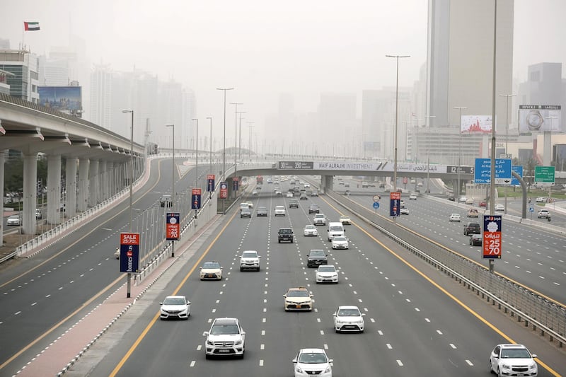 Dubai, United Arab Emirates - March 25, 2019: Hazy weather over Sheikh Zayed Road and the Marina. Mponday the 25th of March 2019 in Dubai. Chris Whiteoak / The National