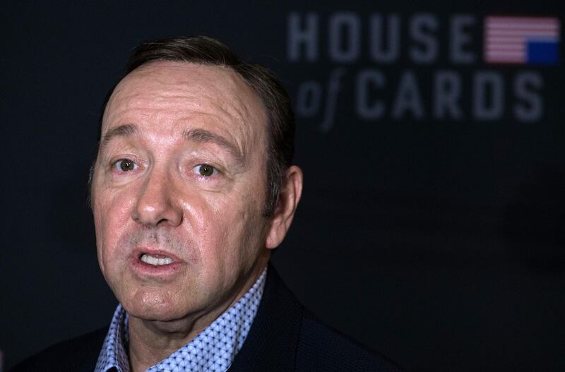 (FILES): This file photo taken on February 23, 2016 shows actor Kevin Spacey arriving for  the season 4 premiere screening of the Netflix show "House of Cards" in Washington, DC. 
A man has accused Kevin Spacey of attempting to rape him when he was 15, amid mounting allegations of sexual harassment and assault against the "House of Cards" star.In an interview with the Vulture website, the man, who spoke on condition of anonymity, said he took part in an acting class taught by Spacey when he was 12. Two years later, they began what the man described in the interview as a "sexual relationship."


 / AFP PHOTO / Nicholas Kamm