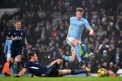 MANCHESTER, ENGLAND - DECEMBER 16:  Jan Vertonghen of Tottenham Hotspur fouls Kevin De Bruyne of Manchester City and a penalty is awarded during the Premier League match between Manchester City and Tottenham Hotspur at Etihad Stadium on December 16, 2017 in Manchester, England.  (Photo by Laurence Griffiths/Getty Images)