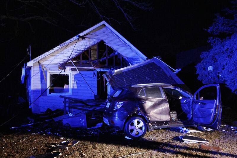 A tornado-damaged home and vehicle in Griffin, Georgia. EPA