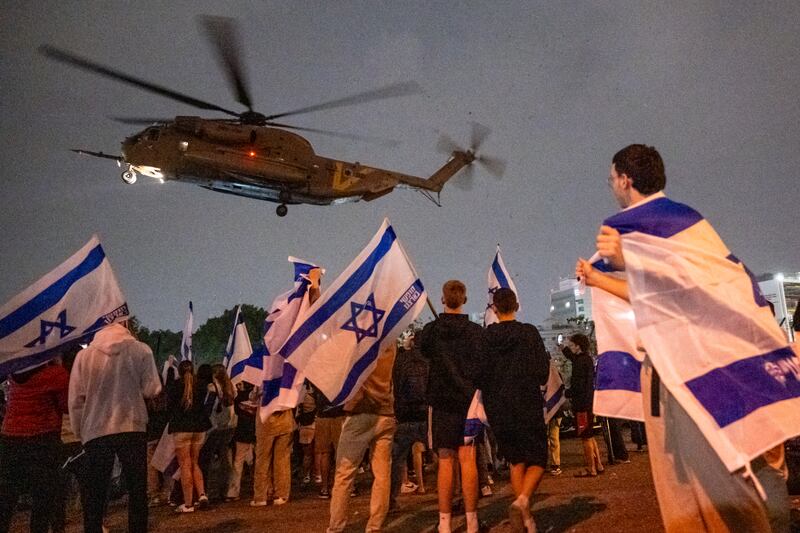 A helicopter carrying Israeli hostages released by Hamas lands in Petah Tikva, Israel. Getty Images
