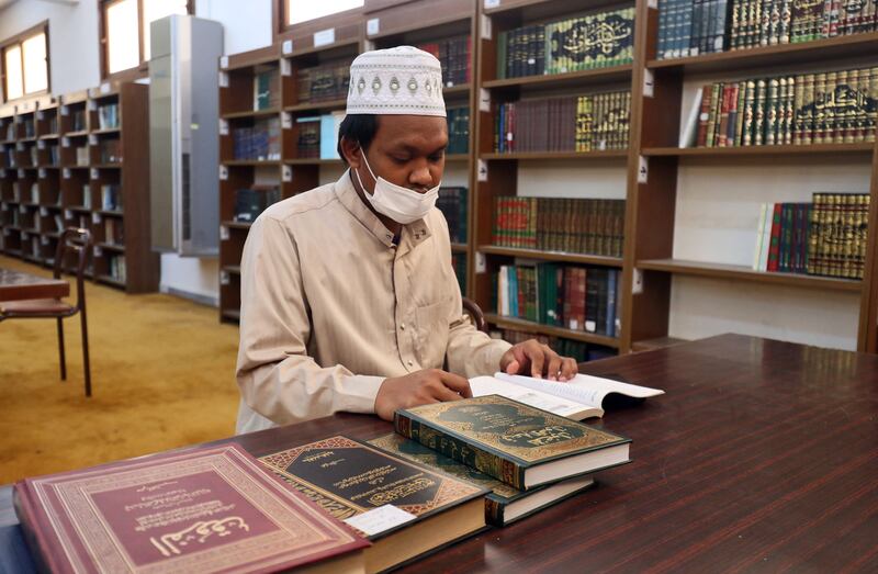 A student reads at the Sufi mosque in Zliten. Libya's plunge into chaos after dictator Muammar Qaddafi was ousted in 2011 gave a free hand to militias, some of whom are hostile to Sufi 'heretics'.