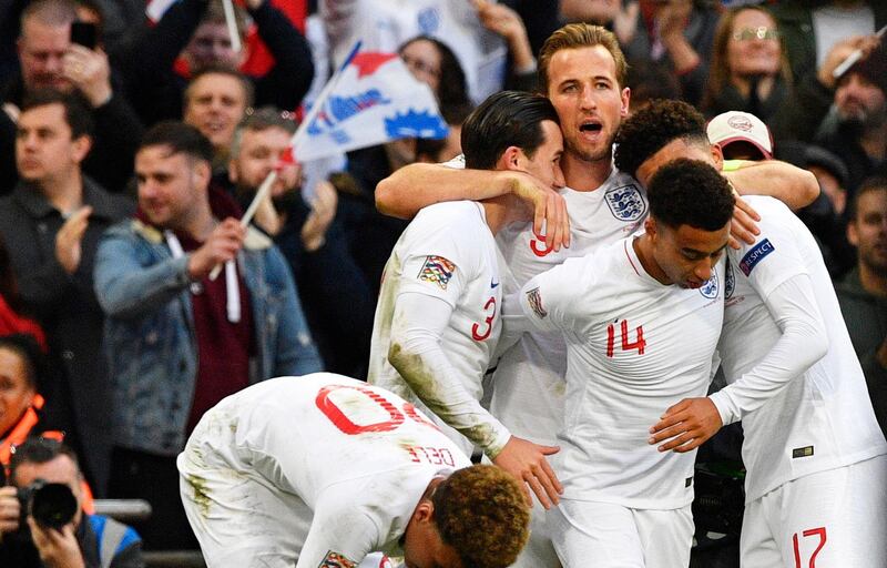 epa07175519 England's Harry Kane (C) celebrates with his teammates after scoring the 2-1 lead during the UEFA Nations League soccer match between England and Croatia in London, Britain, 18 November 2018.  EPA/NEIL HALL