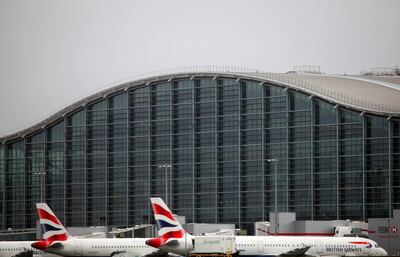 British Airways aircraft in front of Heathrow's Terminal 5 which has been built at the Western end of London Heathrow in between the airports two runways Courtesy British Airways