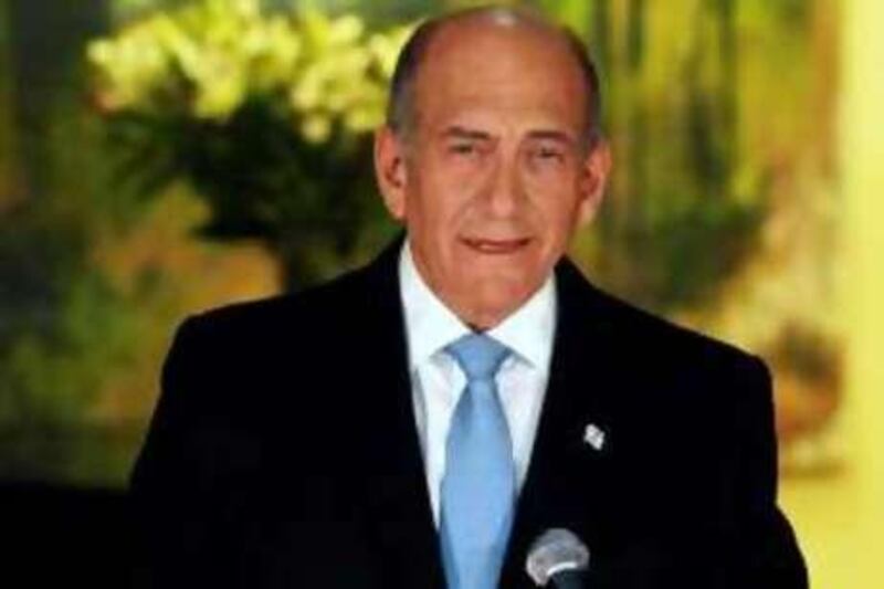 Israel's Prime Minister Ehud Olmert delivers a statement to the media at his official residence in Jerusalem July 30, 2008, in this picture released by the Israeli Government Press Office (GPO). Dogged by corruption scandals, Olmert said on Wednesday he would resign after his ruling Kadima party chooses a new leader in a September 17 internal election. REUTERS/Avi Ohayon/GPO/Handout (JERUSALEM).  FOR EDITORIAL USE ONLY. NOT FOR SALE FOR MARKETING OR ADVERTISING CAMPAIGNS. ISRAEL OUT. NO COMMERCIAL OR EDITORIAL SALES IN ISRAEL. *** Local Caption ***  JER27_ISRAEL-_0730_11.JPG