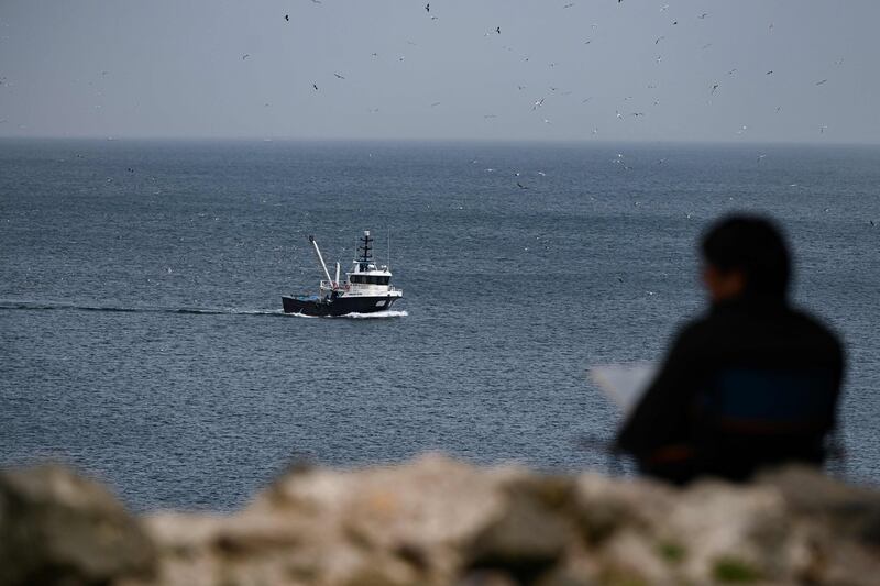 A fishing boat returns to port on the Sea of Marmara, which connects the Black Sea to the Agean Sea.
