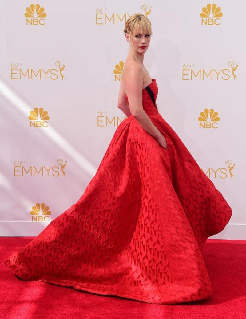 January Jones wears red Prabal Gurung to the 66th Annual Primetime Emmy Awards on August 25, 2014. AFP