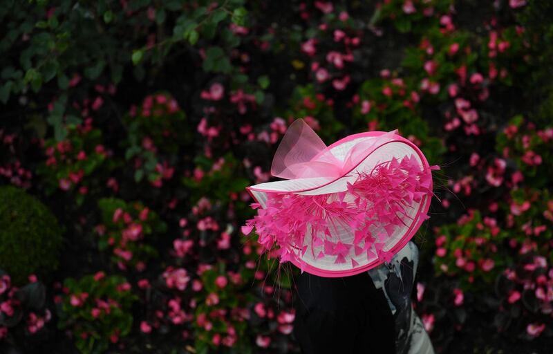 Ascot is all about drama, as shown with this petal strewn hat. EPA