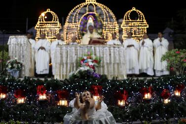 Members of the Christian expatriate community attend a mass on Christmas Eve at Santa Maria Church in Dubai, United Arab Emirates, late December 24, 2018. REUTERS/Ahmed Jadallah