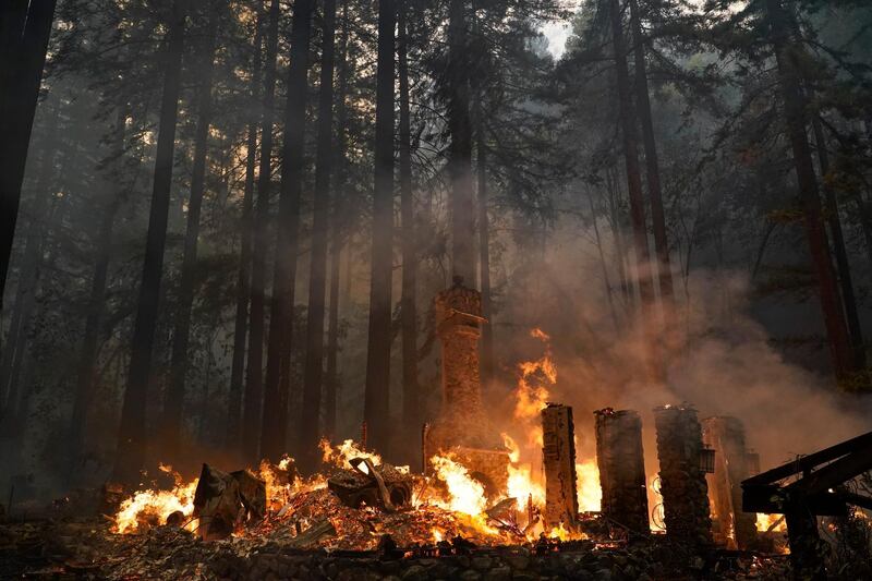 A home is burned to the ground by the CZU August Lightning Complex Fire in Ben Lomond, California. AP Photo