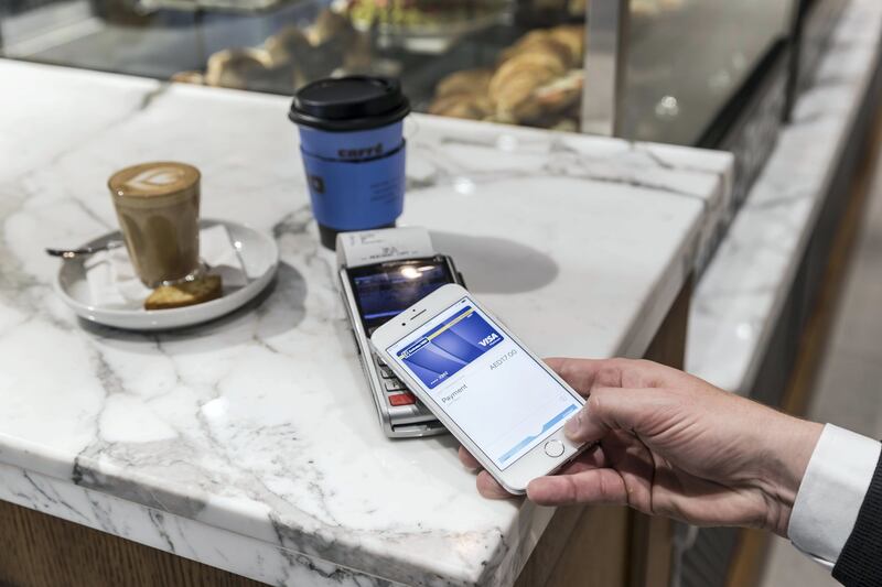 DUBAI, UNITED ARAB EMIRATES. 24 October 2017. Apple Pay launched in the UAE. Used to pay for take away at Cafe Nero in Dubai Mall. (Photo: Antonie Robertson/The National) Journalist: Caline Malek. Section: National.