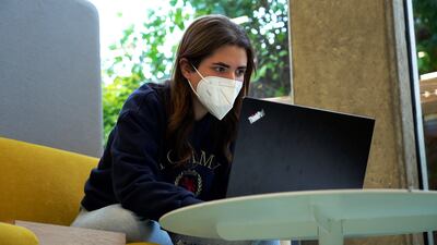 Lyne Mneimneh works from her laptop at a co-working space in Beirut.