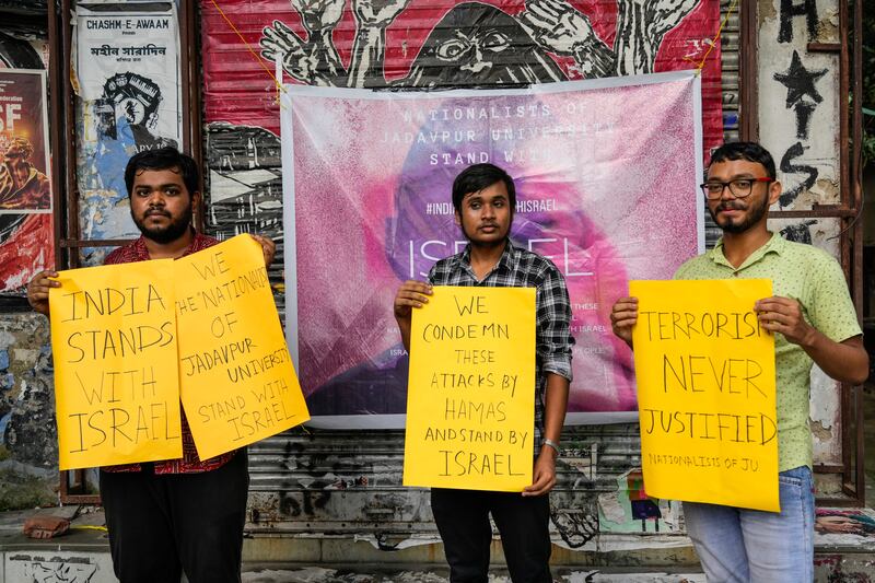 Student activists from Nationalists of Jadavpur University hold placards in solidarity with Israel, at Jadavpur University in Kolkata, India. AP