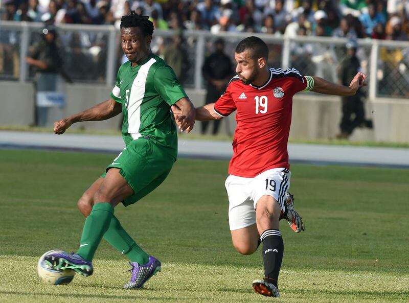 Egypt’s forward Abdallah El-Said (R) vies with Nigeria’s midfielder Efe Ambrose during the African Cup of Nations qualification match between Egypt and Nigeria, on March 25, 2016, in Kaduna. AFP / PIUS UTOMI