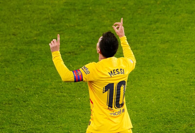 Barcelona's Lionel Messi celebrates scoring their third goal. Reuters