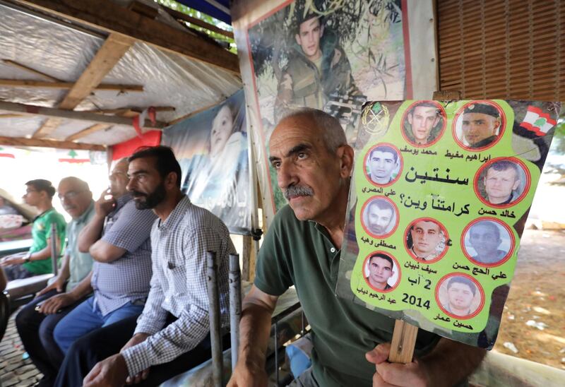 Relatives of Lebanese soldiers taken hostage by jihadists in 2014 sit inside a tent as they gather in downtown Beirut on August 27, 2017 awaiting news of their loved ones, after the army announced it would pause its offensive against the Islamic State (IS) group on the country's eastern border with Syria in exchange for more information on the missing troops.
Nine troops are believed to still be held by IS after militants overran the Lebanese border town of Arsal in August 2014 and kidnapped 30 soldiers and police. The army has said the missing troops were its "top concern" in its offensive against an estimated 600 IS fighters using the hilly border region as a base.
 / AFP PHOTO / ANWAR AMRO