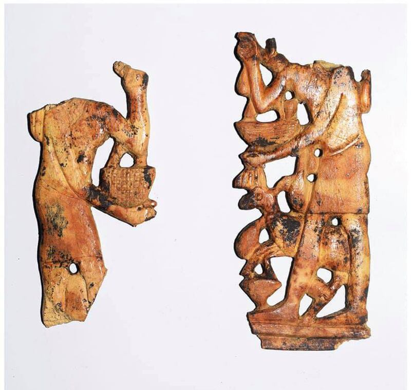 Two ivory reliefs uncovered at the Tel El Farain archaeological site in northern Egypt. The pieces depict scenes of women making offerings to the gods.