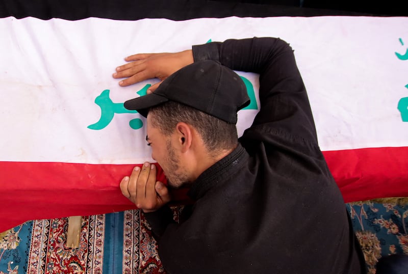 The ceremony took place at a cemetery in Najaf, central Iraq. AFP