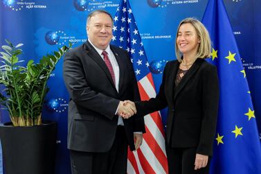 US Secretary of State Mike Pompeo poses with European Union foreign policy chief Federica Mogherini in Brussels. Reuters