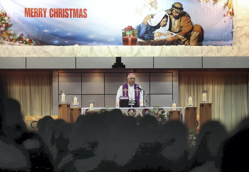 Abu Dhabi, United Arab Emirates - December 24th, 2017: St Joseph's outdoor Christmas Eve Mass. Sunday, December 24th, 2017 at St Joseph's Cathedral in Abu Dhabi. Chris Whiteoak / The National