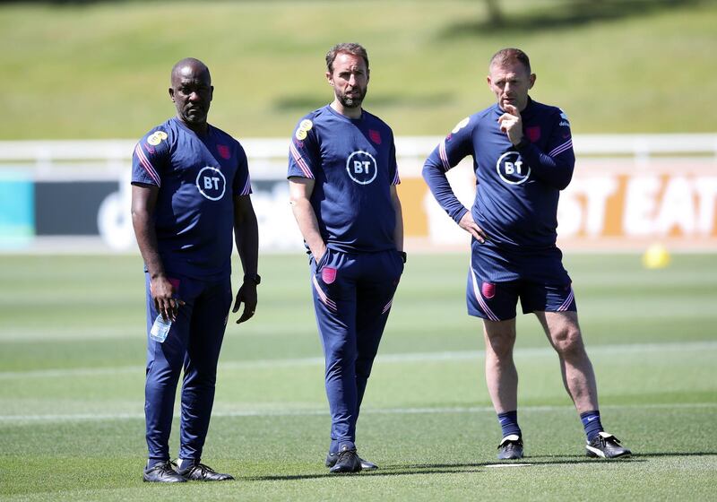 Left to right: England coaching staff Chris Powell, Gareth Southgate and Graeme Jones. PA