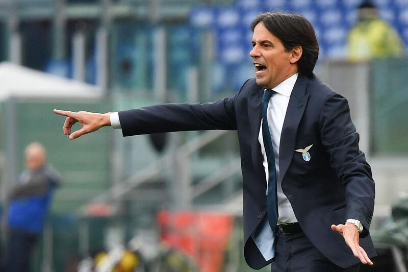 (FILES) In this file photo taken on January 18, 2020 Lazio's Italian head coach Simone Inzaghi shouts instructions to his players from the touchline during the Italian Serie A football match Lazio Rome vs Sampdoria on January 18, 2020 at the Olympic stadium in Rome. Serie A champions Inter Milan have named Simone Inzaghi as their new coach following the departure of Antonio Conte, the club announced on June 03, 2021.  / AFP / Alberto PIZZOLI
