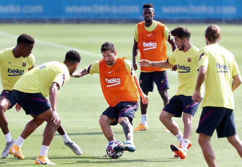Barcelona's Lionel Messi in a familiar situation - surrounded by players. EPA