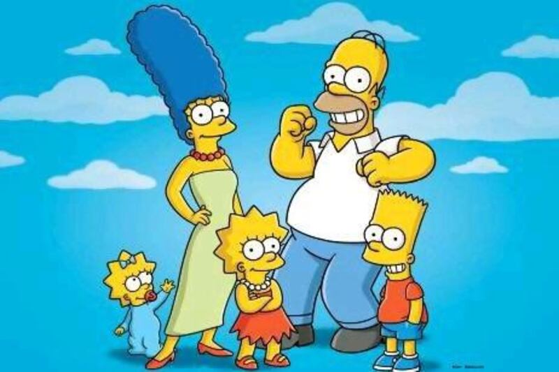 The Simpsons from left, Maggie, Marge, Lisa, Homer and Bart. Fox / AP Photo