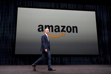 Amazon CEO Jeff Bezos seen walking on stage at a press conference where he introduced new Kindle products at Santa Monica Airport in California in September 2012. EPA
