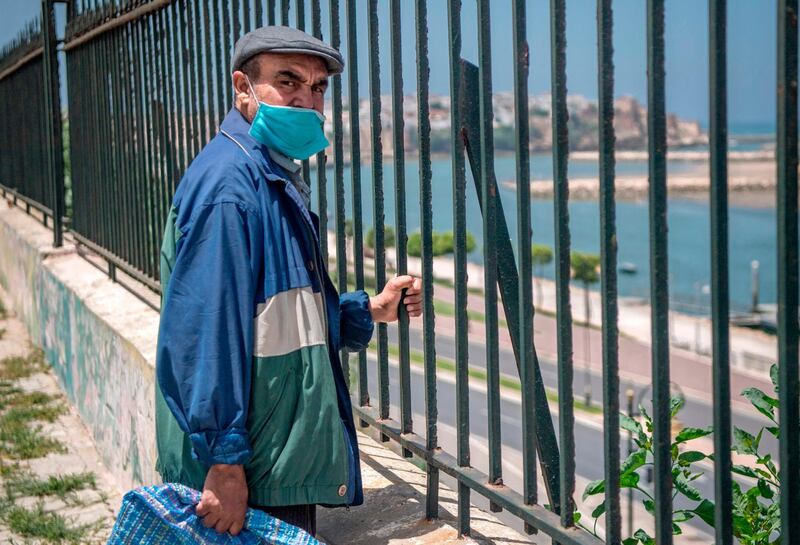 A taxi driver looks on before getting tested for the coronavirus in Morocco's capital Rabat. AFP