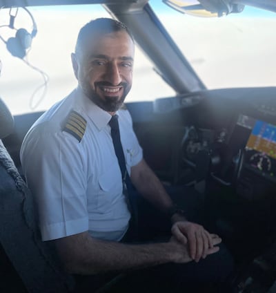 Captain Majed Al Marzouqi piloted Etihad's inaugural non-stop flight from Abu Dhabi to Boston. Hayley Skirka / The National