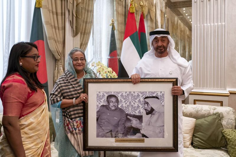 ABU DHABI, UNITED ARAB EMIRATES - February 18, 2019: HH Sheikh Mohamed bin Zayed Al Nahyan, Crown Prince of Abu Dhabi and Deputy Supreme Commander of the UAE Armed Forces (R) stands for a photograph with HE Sheikha Hasina, Prime Minister of Bangladesh (C), at the Sea Palace.

( Ryan Carter / Ministry of Presidential Affairs )
---