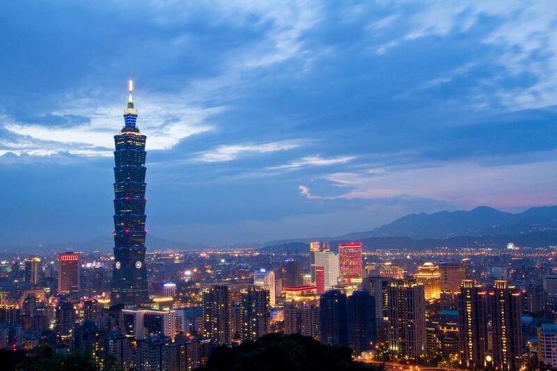 Residential and commercial buildings rise out of the skyline in Taipei. Maurice Tsai / Bloomberg

