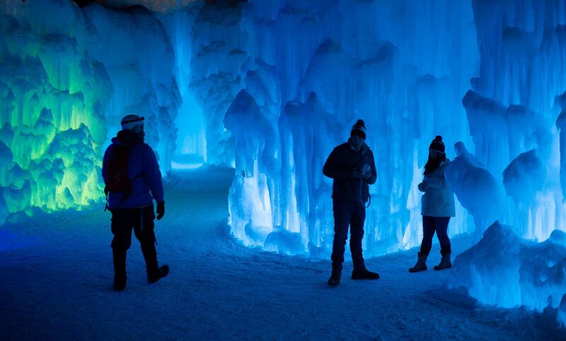 Visitors walk through the ice castle formation in North Woodstock, New Hampshire, USA.  EPA