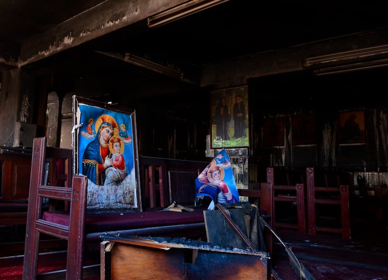 The fire-damaged church interior. AP 