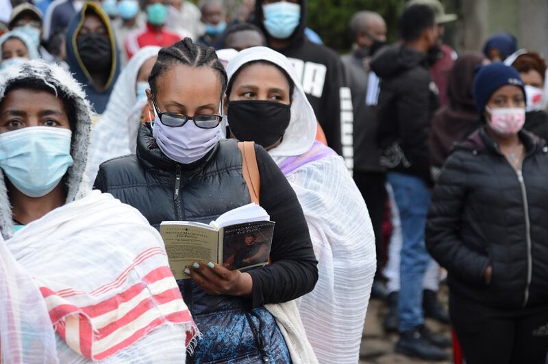 Voters waited in queues for hours in some areas to cast their ballots. EPA