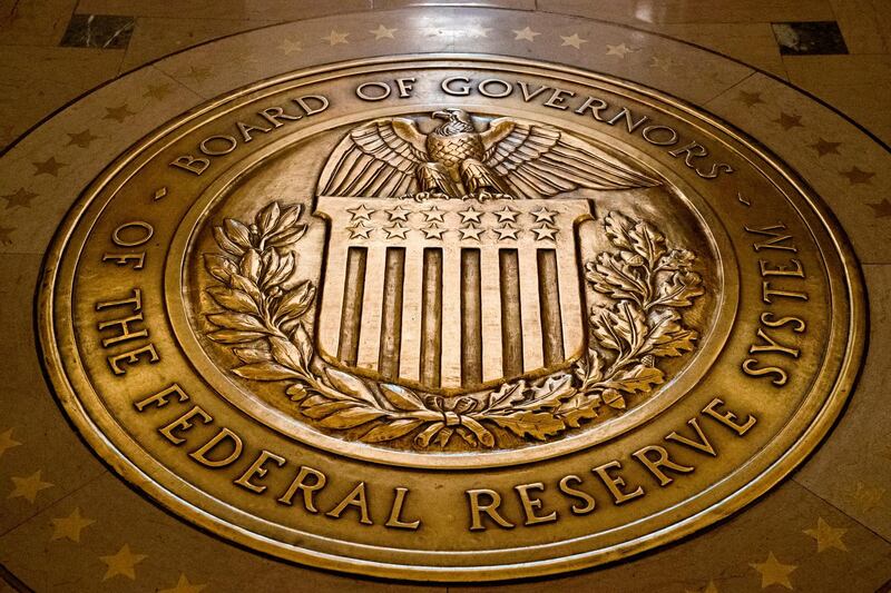 FILE- In this Feb. 5, 2018, file photo, the seal of the Board of Governors of the United States Federal Reserve System is displayed in the ground at the Marriner S. Eccles Federal Reserve Board Building in Washington. Richard Clarida, President Donald Trump's nominee for the No. 2 post at the Federal Reserve, pledged on Tuesday, May 15, to support the Fed's twin goals of stabilizing inflation and maximizing employment while also declaring the importance of the central bankâ€™s independence. (AP Photo/Andrew Harnik, File)
