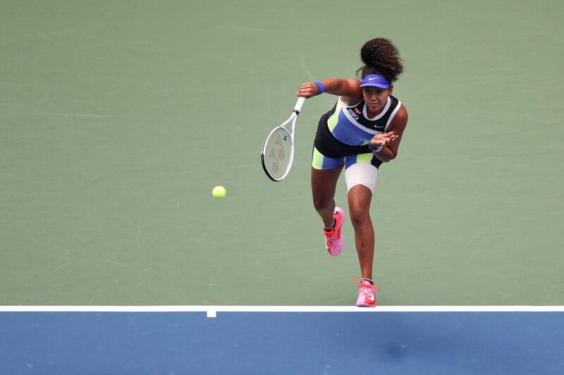 NEW YORK, NEW YORK - SEPTEMBER 12: Naomi Osaka of Japan serves the ball in the first set during her Women's Singles final match against Victoria Azarenka of Belarus on Day Thirteen of the 2020 US Open at the USTA Billie Jean King National Tennis Center on September 12, 2020 in the Queens borough of New York City.   Matthew Stockman/Getty Images/AFP (Photo by MATTHEW STOCKMAN / GETTY IMAGES NORTH AMERICA / AFP)