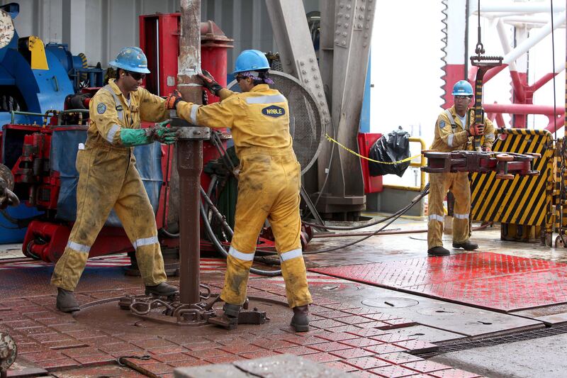 RAS AL KHAIMAH , UNITED ARAB EMIRATES – May 2 , 2013 : Workers at the Saleh oil field in Ras Al Khaimah. DNO International is operating on this oil field. ( Pawan Singh / The National ) For Business. Story by April Yee

     This set of photos is for a photo page in Business to run over Ramadan 2013. DO NOT USE BEFORE THEN (unless of course there is a news story in Biz).