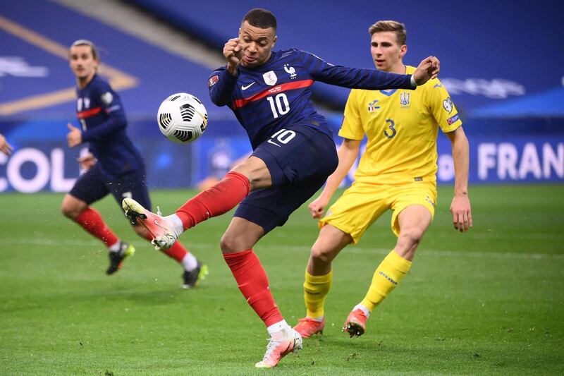 Kylian Mbappe fails to connect with a shot. AFP