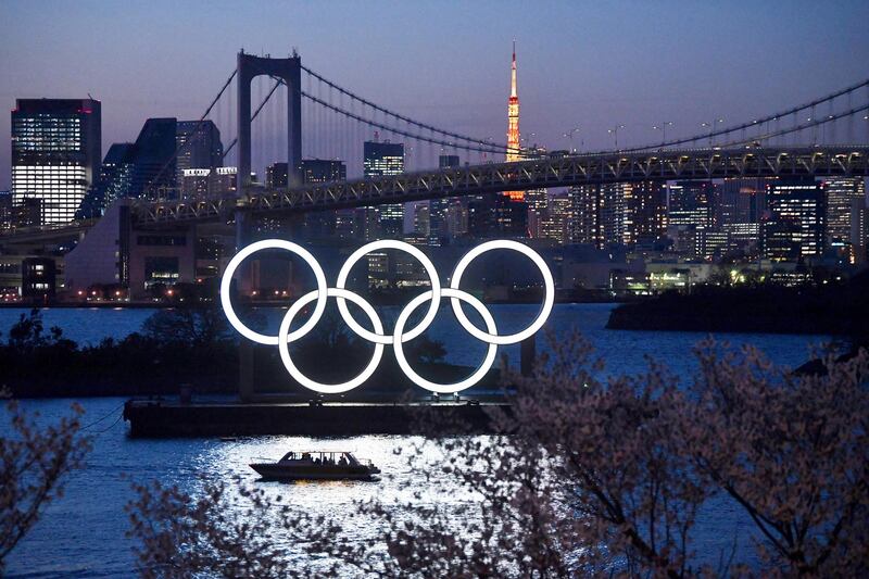 TOKYO, JAPAN - MARCH 25: A boat sails past the Tokyo 2020 Olympic Rings on March 25, 2020 in Tokyo, Japan. Following yesterdays announcement that the Tokyo 2020 Olympics will be postponed to 2021 because of the ongoing Covid-19 coronavirus pandemic, IOC officials have said they hope to confirm a new Olympics date as soon as possible. (Photo by Carl Court/Getty Images)