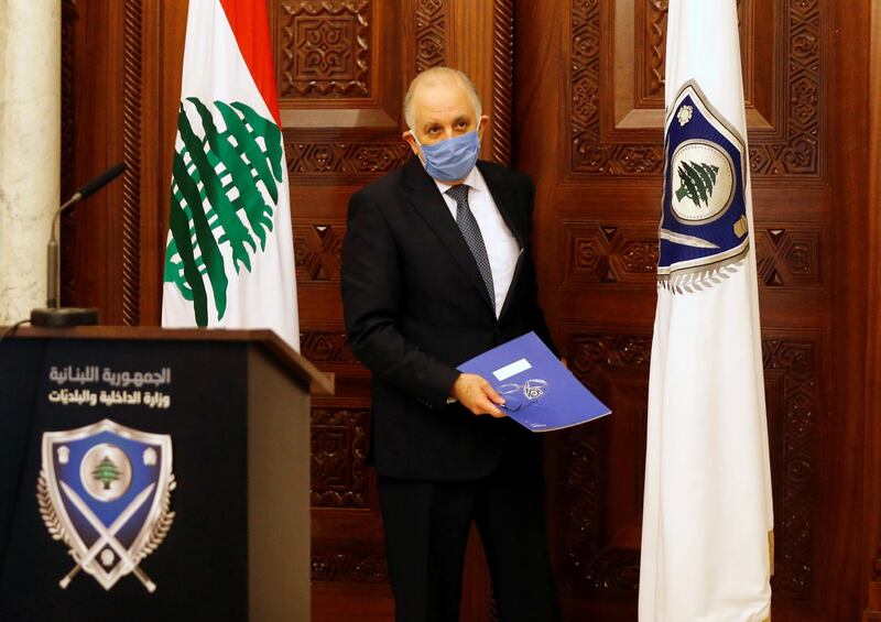Lebanon's Interior Minister, Mohammad Fahmi wears a protective mask as he arrives for a news conference, after Lebanese Prime Minister, Hassan Diab asked the security forces on Saturday to enforce stricter measures to keep people indoors and prevent gatherings to curb the coronavirus disease (COVID-19) outbreak, in Beirut, Lebanon March 22, 2020. REUTERS/Mohamed Azakir
